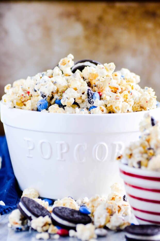 White chocolate coated kettle corn, M&MS, and Firecracker Oreos come together in just a few minutes to make this Firecracker Popcorn Chow.