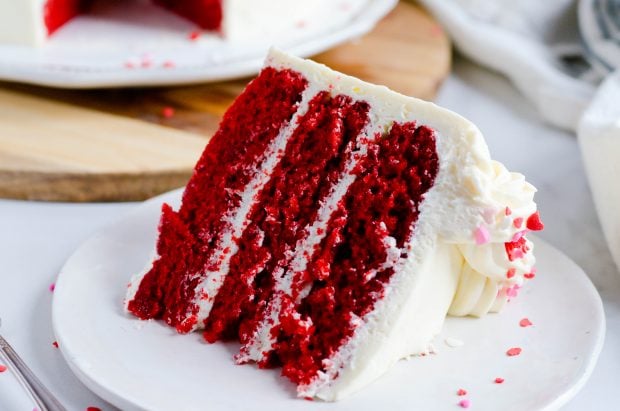 This Red Velvet Cake with White Chocolate has three layers of delicious, moist red velvet cake filled and frosted with white chocolate buttercream.