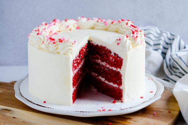 This Red Velvet Cake with White Chocolate has three layers of delicious, moist red velvet cake filled and frosted with white chocolate buttercream.