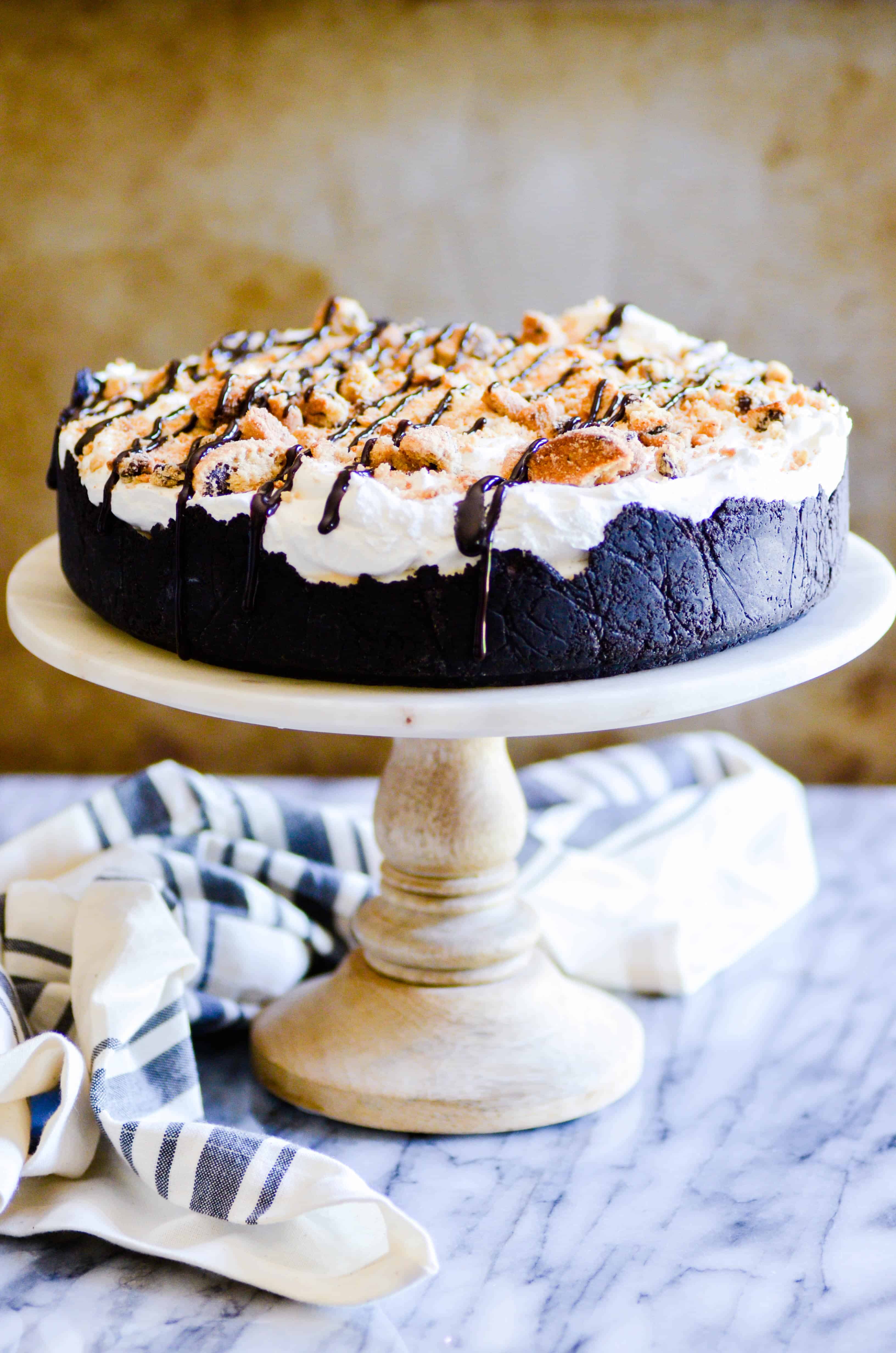 Seven layers of chocolate chip cookies and whipped cream piled into an Oreo crust. No need to break a sweat with this dreamy No Bake Milk & Cookies Pie-- it's so easy!