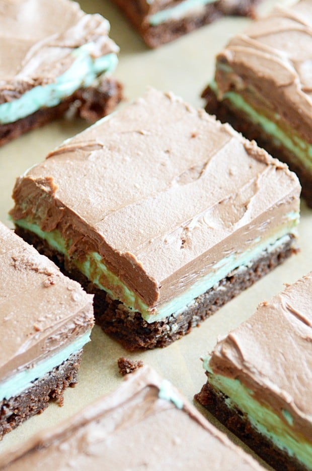 Extra fudgy brownies topped with vanilla mint frosting and creamy chocolate frosting.