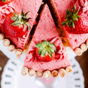 Light and fluffy lemon cake with a dreamy homemade strawberry buttercream. The perfect spring dessert!