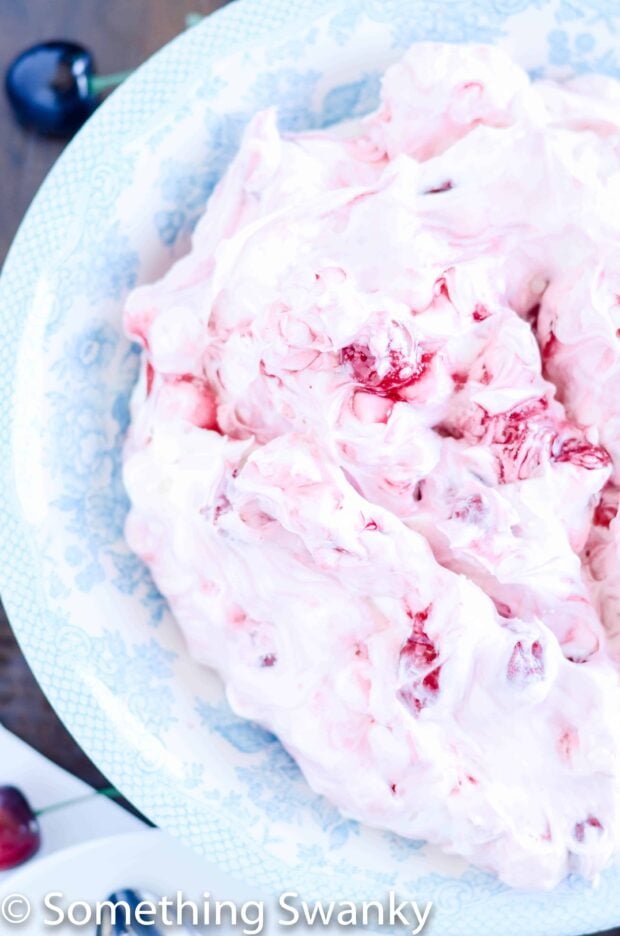 Cherry Cheesecake fluff is and easy and delicious side dish that is perfect for summer BBQ and potlucks. So light and fluffy, you won't be able to resist!