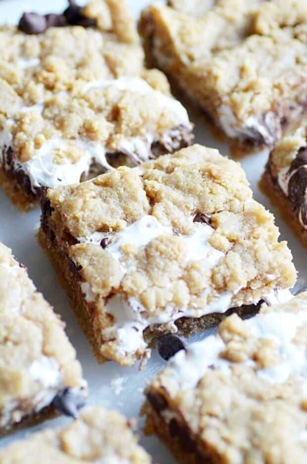 Soft, chewy, and slightly crunchy graham cracker cookie bars with a marshmallow swirl and semi-sweet chocolate chips.