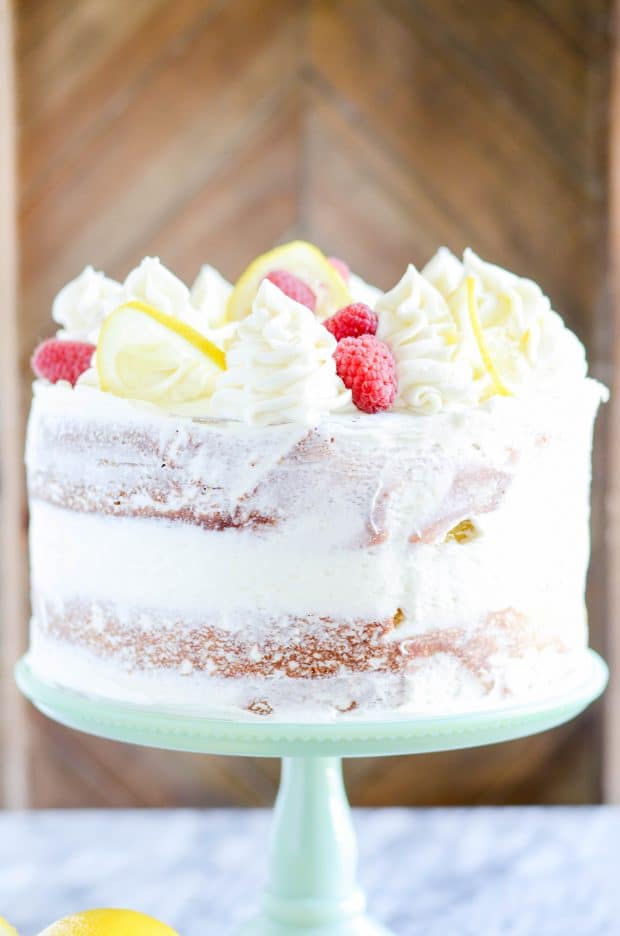 A rich lemon cake that tastes incredible with lemon cream cheese frosting and your favorite berries!