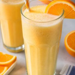 This homemade orange julius recipe tastes just like the mall classic! Creamy, frothy & ready in minutes. 🍊 You have to try it!