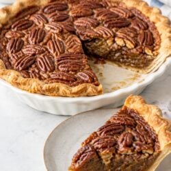 Easy mini pecan pie recipe using store-bought crust! Gooey, buttery filling in cute individual pies—perfect for Thanksgiving dessert. 🥧