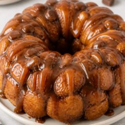 This rolo monkey bread is gooey, chocolatey, and SO easy to make! Pull-apart perfection that'll have everyone begging for the recipe. 🍫