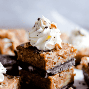 No bake pecan pie filling spread over a simple Oreo crust. These Oreo Pecan Pie Bars are a fun and EASY twist on a Thanksgiving classic!