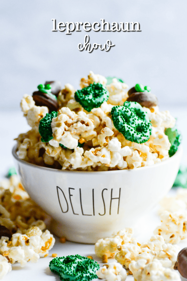 White chocolate coated kettle corn and rice cereal with candy coated pretzel "clovers".